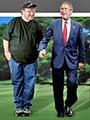 Adobe Photoshop Blog - Michael Moore and President George Bush walking hand-in-hand
