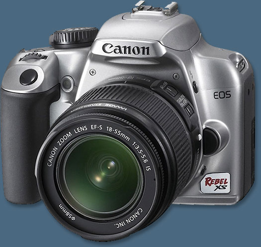 Canon Digital Rebel XSi 12MP Digital SLR Camera with EF-S 18-55mm f/3.5-5.6 IS Lens (Black) + 2GB Pro Accessory Kit at half price